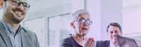 Three employees in a sales dialogue