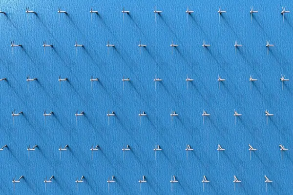 Windräder im Meer von oben fotografiert