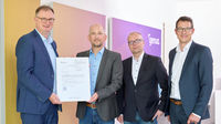 Presentation of the German classification level "RESTRICTED" approval certificate at the genua headquarters